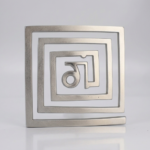 Lead helix Vastu remedy placed in south-west corner of room for earth element correction