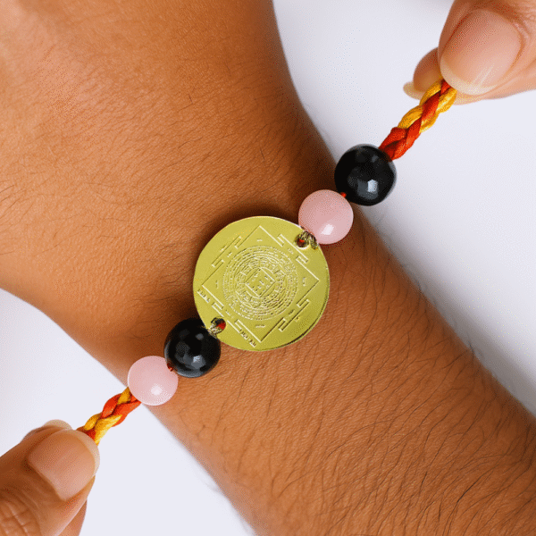 Shri Ram Rakhi with Ram Raksha Yantra & Crystals | Golden-Plated Copper Yantra | For Protection & Divine Blessings